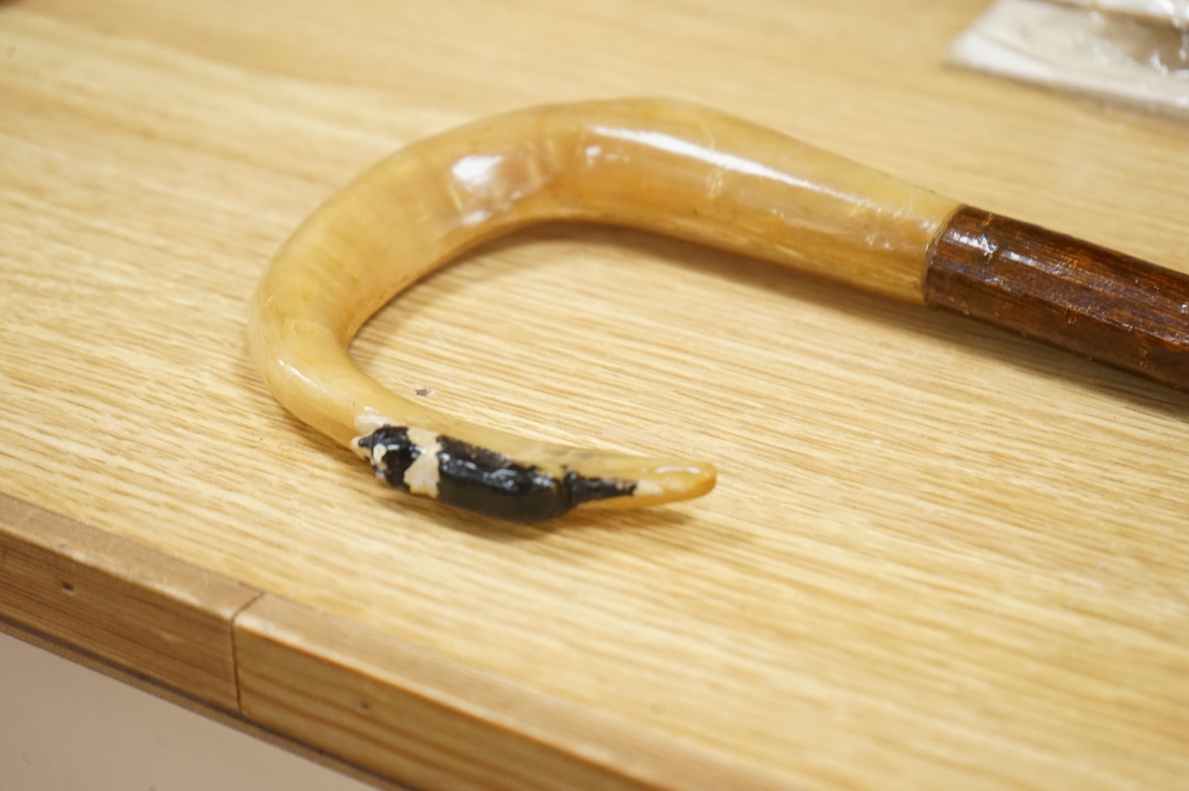 An early to mid 20th century painted wood and horn shepherd’s crook, 132cm in length